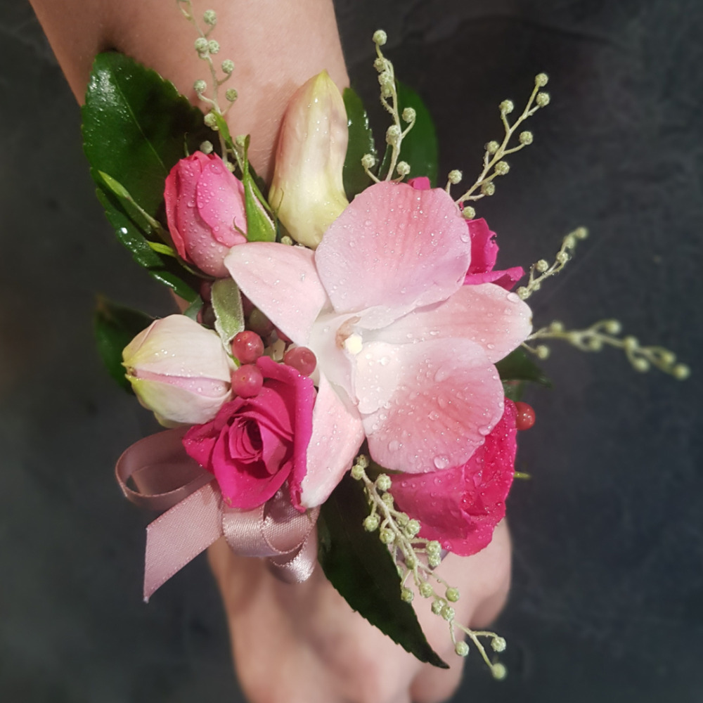 bright pink wrist corsage